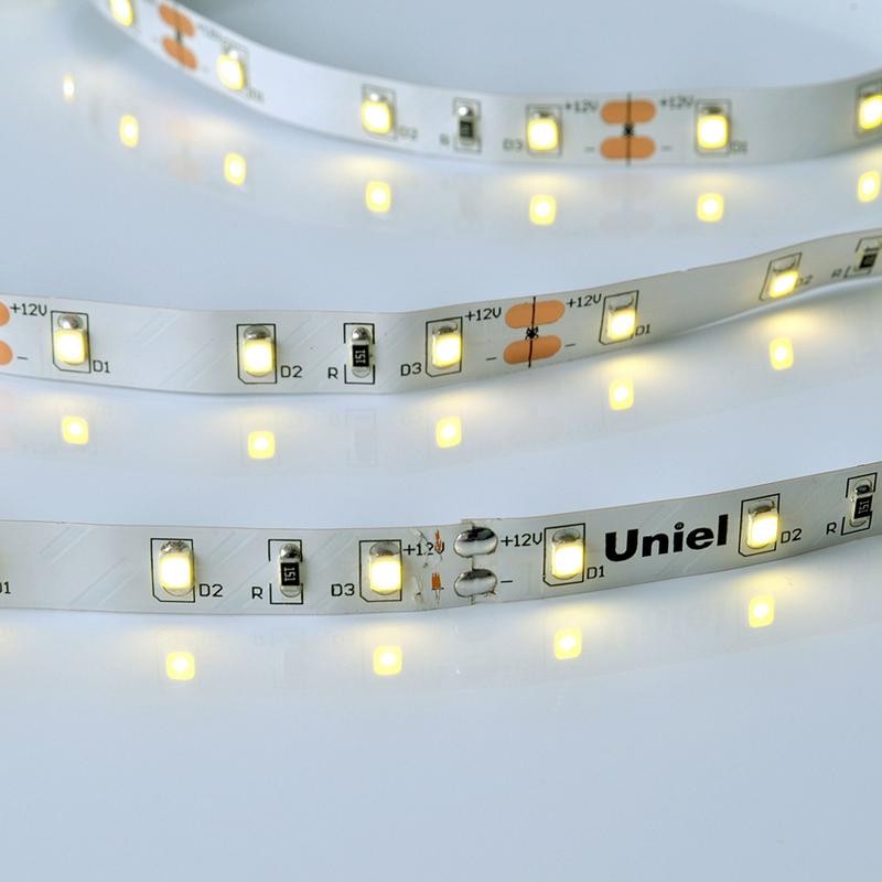 Лента светодиодная ULS-M11-2835-60LED/m-8mm-IP20-DC12V-4.8W/m-4M-4000K PROFI гибкая герметичная на самоклеящейся основе (уп.4м) 